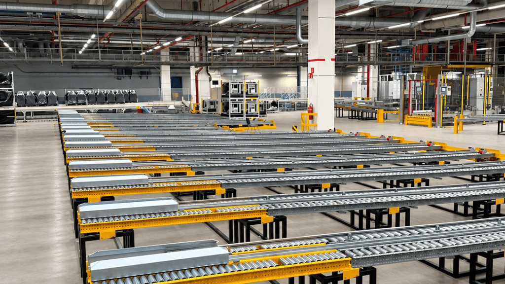Industrial gravity roller conveyor lines in a warehouse